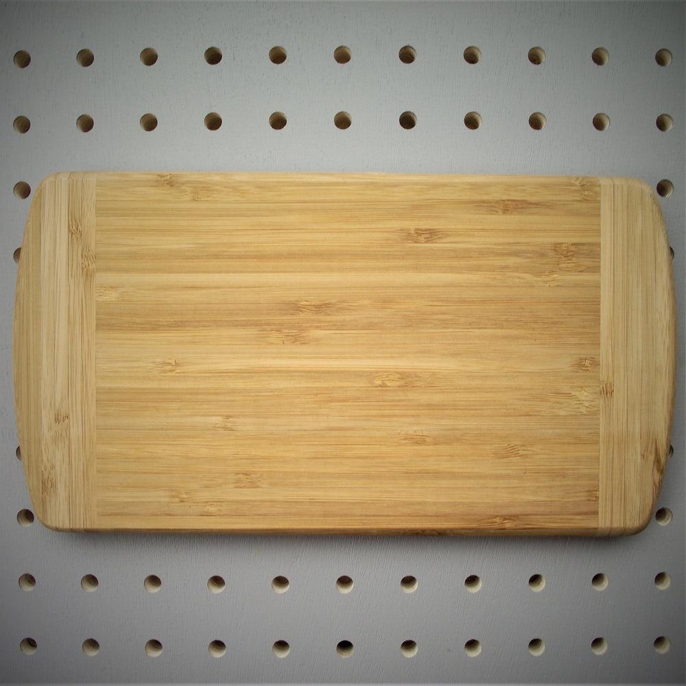 Personalised 'Dads' Bamboo Chopping Board made for you by Custom Gift Studio at Cheshire Oaks