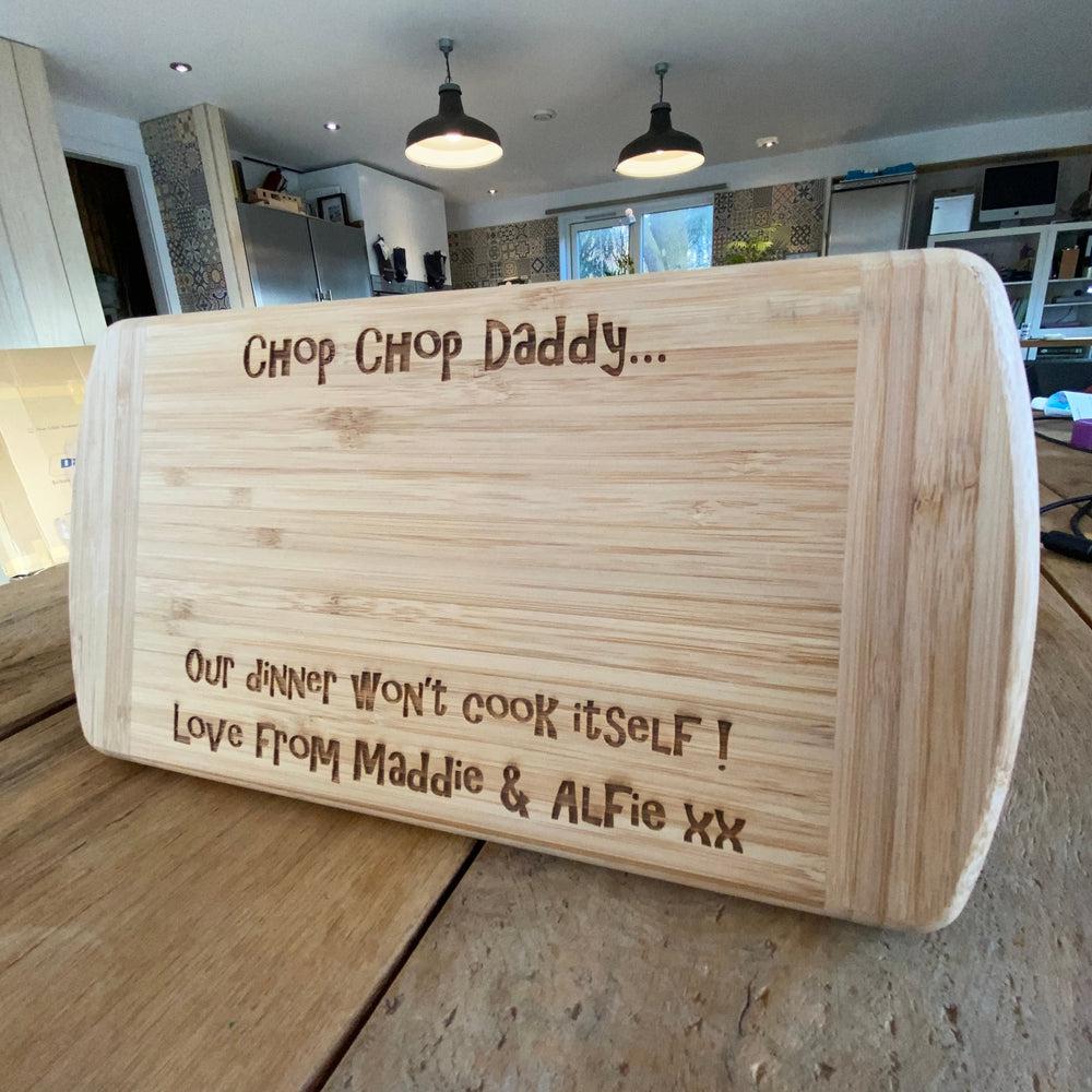 Personalised 'Dads' Bamboo Chopping Board made for you by Custom Gift Studio at Cheshire Oaks